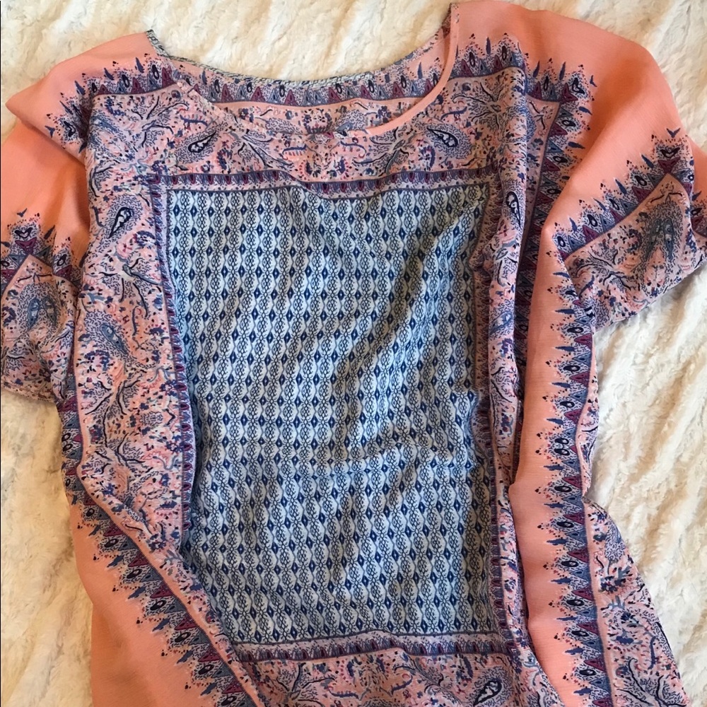 Pink tunic.